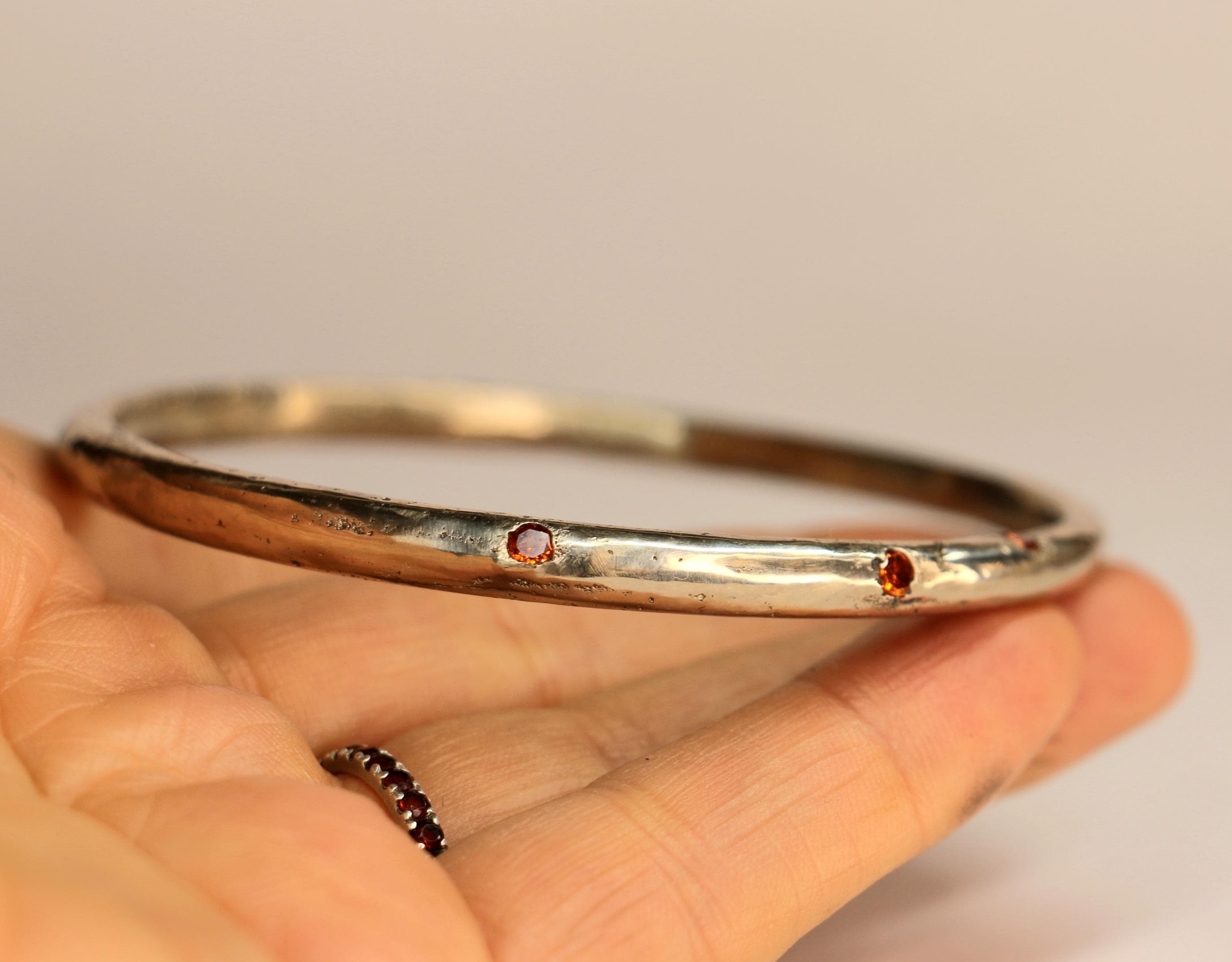 handmade silver bangle with gemstones