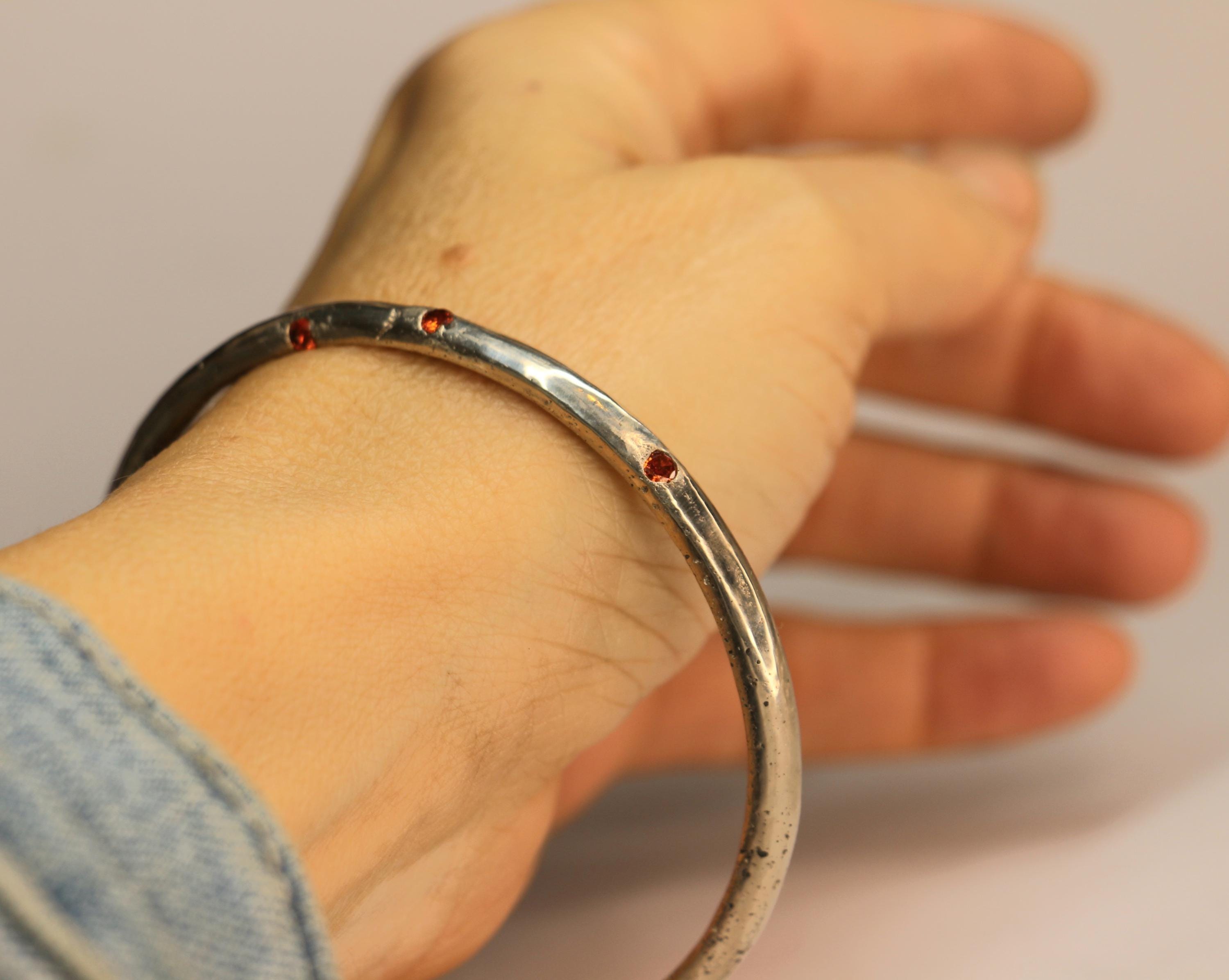 handmade silver bangle with gemstones