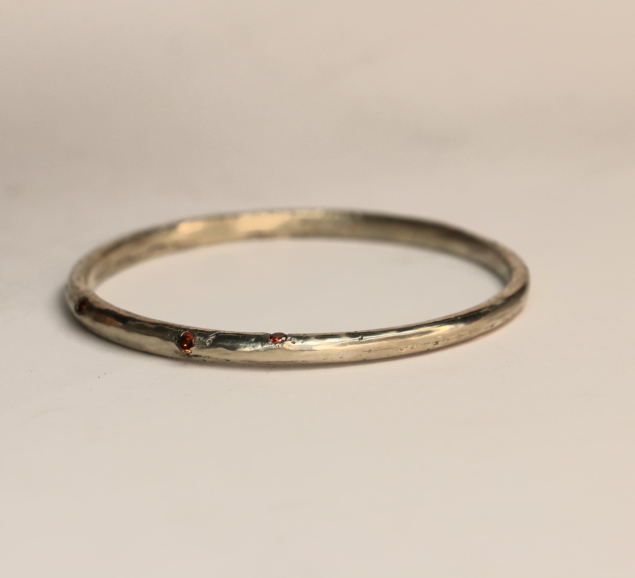 handmade silver bangle with gemstones