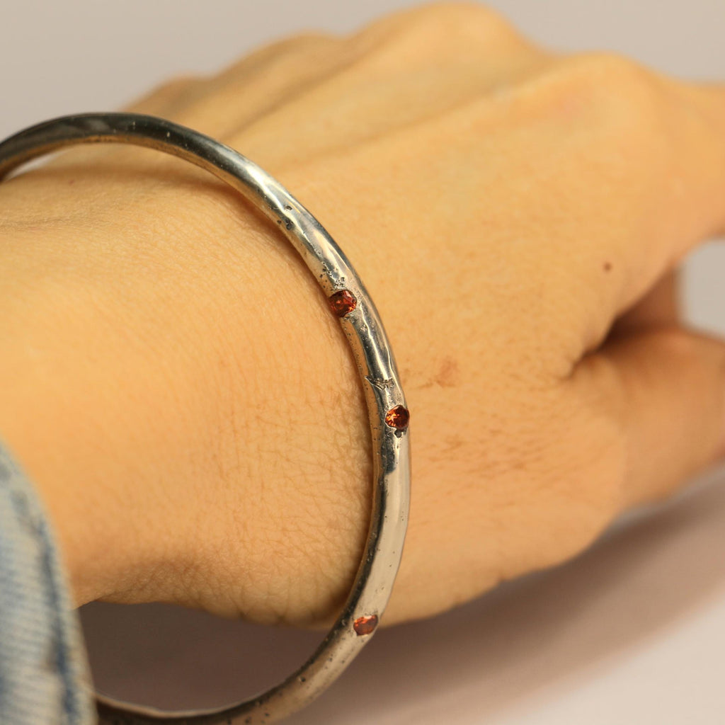 handmade silver bangle with gemstones