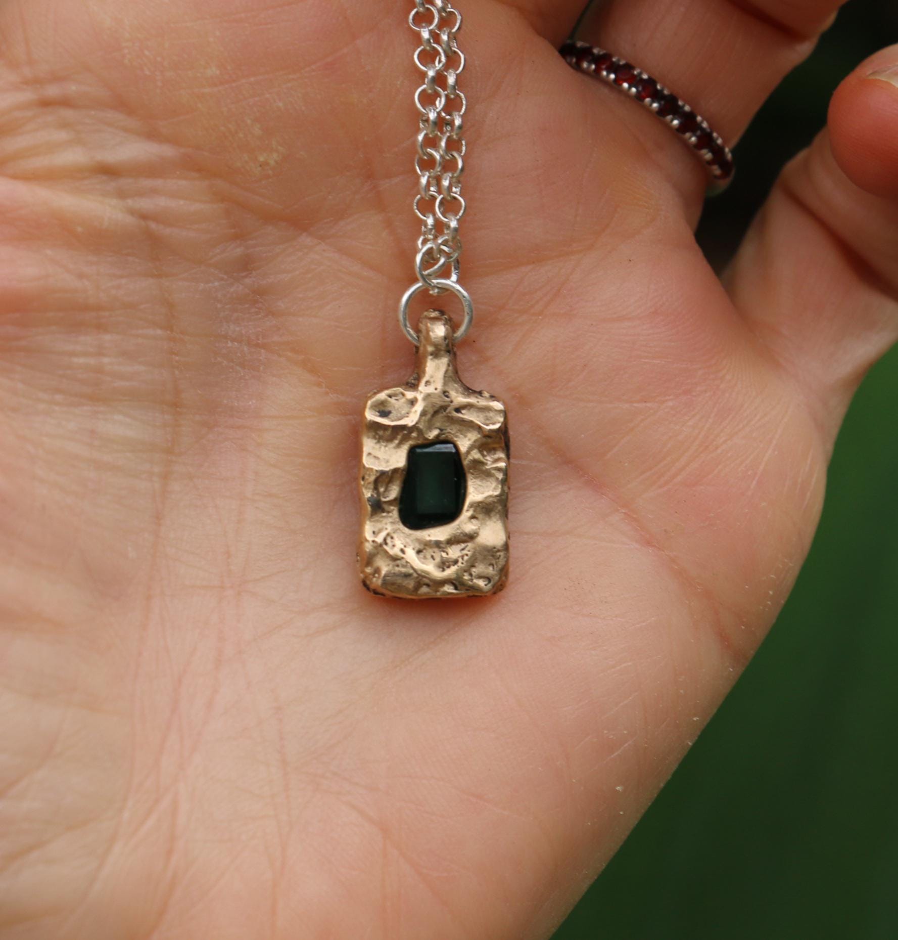 Bronze pendant with emerald necklace
