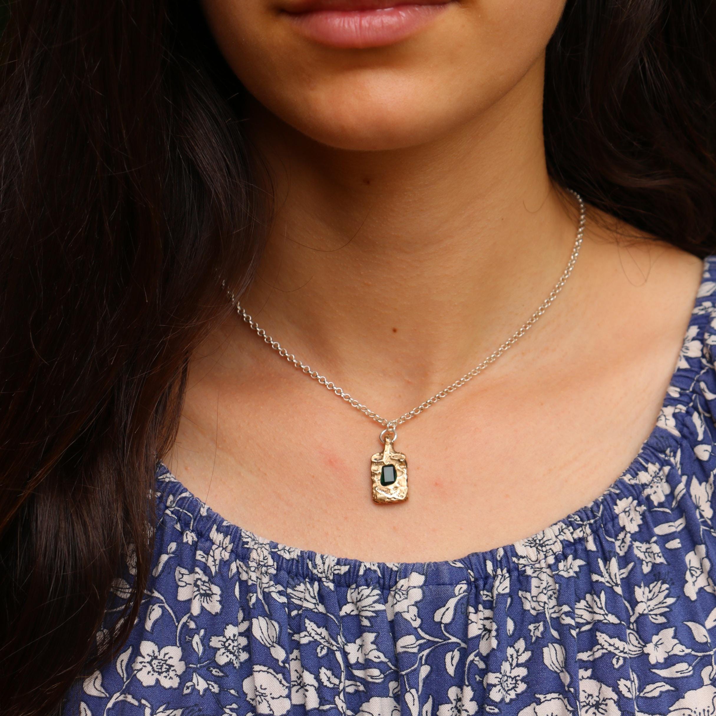Bronze pendant with emerald necklace
