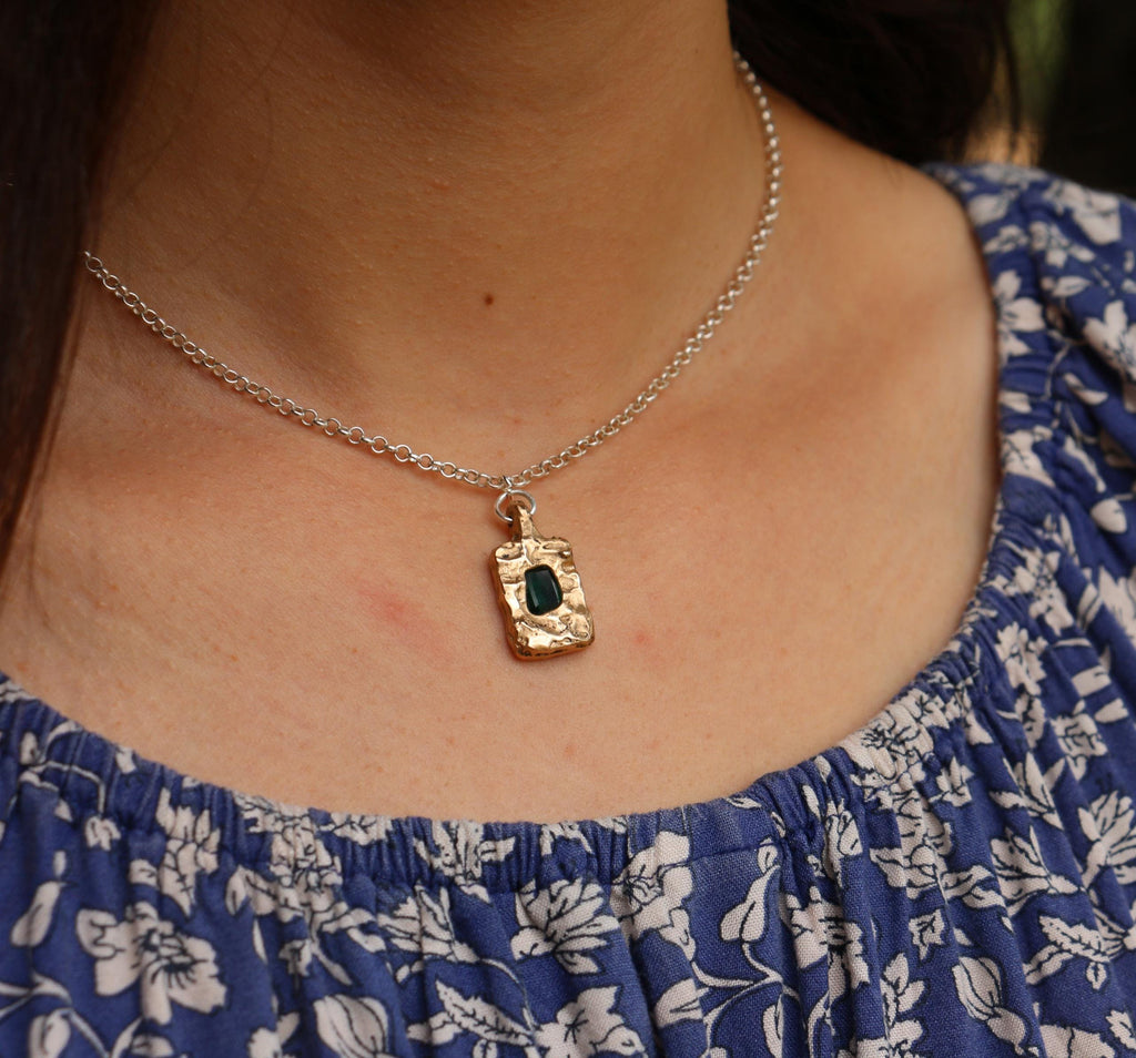 Bronze pendant with emerald necklace