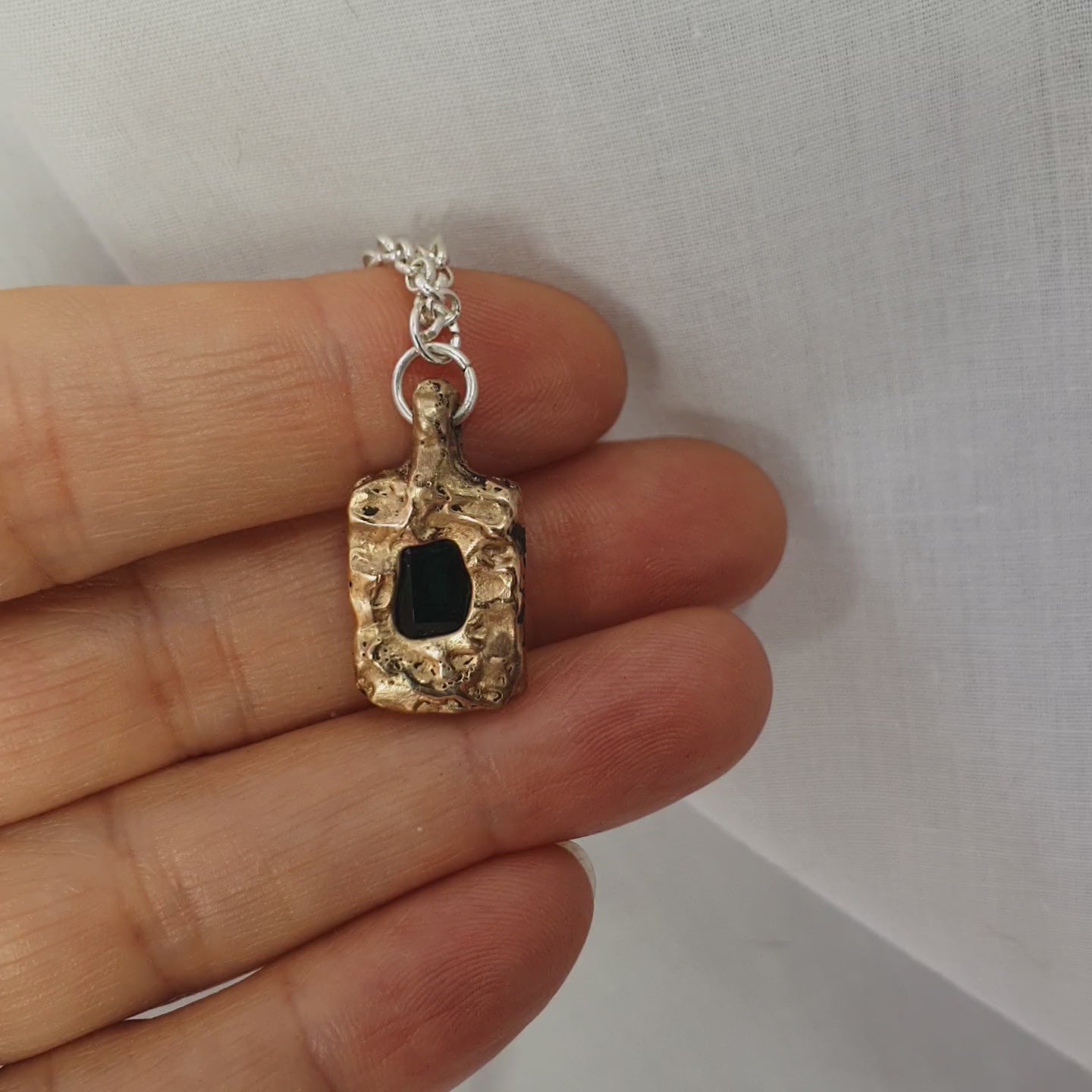 Bronze pendant with emerald necklace