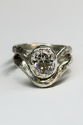 Ember silver organic ring with oval Moissanite size 6