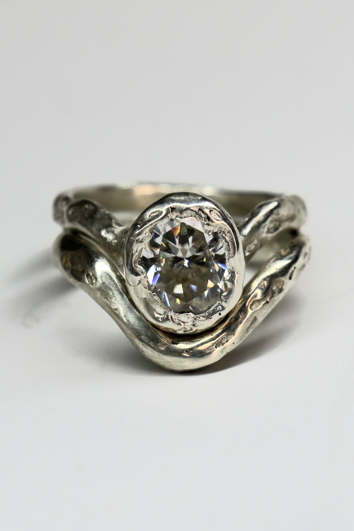 Ember silver organic ring with oval Moissanite size 6